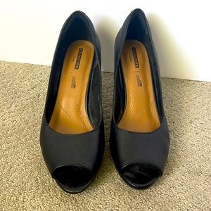 2.5 inch Clark’s cushioned open toe heel. A must have for working on your feet.